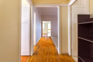 Empty Hallway of a Big House House Design For Narrow Blocks
