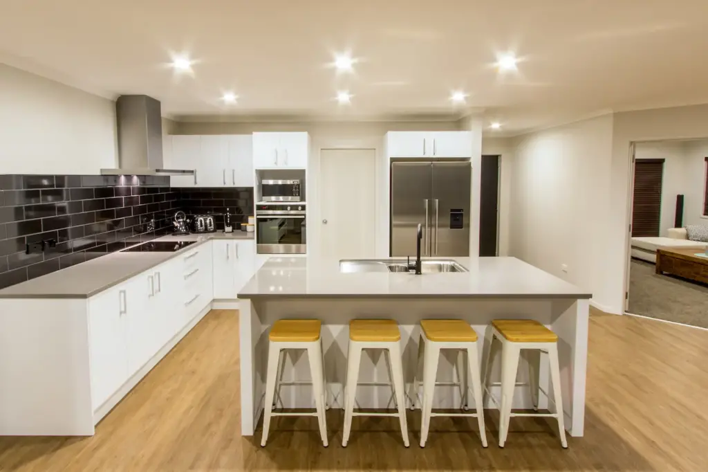 Upgrade To Stone Benchtops, White Modern Kitchen With Stone Benchtops And Appliances